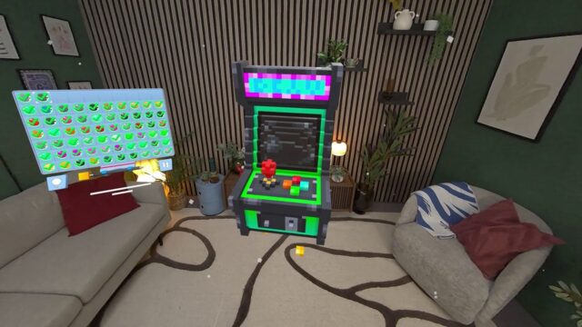 Floating arcade cabinet in a cozy living room between a sofa and an armchair, with plants and shelves nearby.