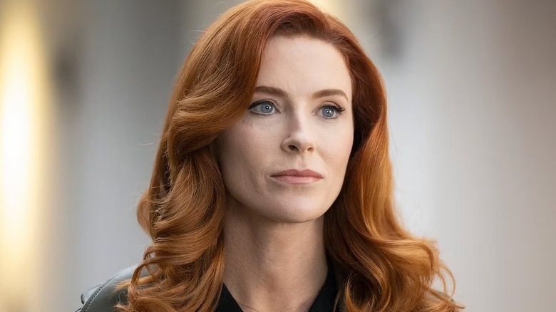 Monica (Bridget Regan) standing in a grey-painted room on "The Rookie."