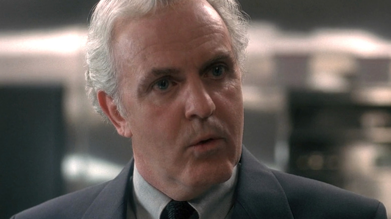 James Handy wearing a gray suit in "The X-Files."