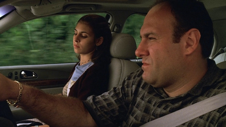 James Gandolfini as Tony driving in the car next to Jamie-Lynn Sigler as Meadow in The Sopranos