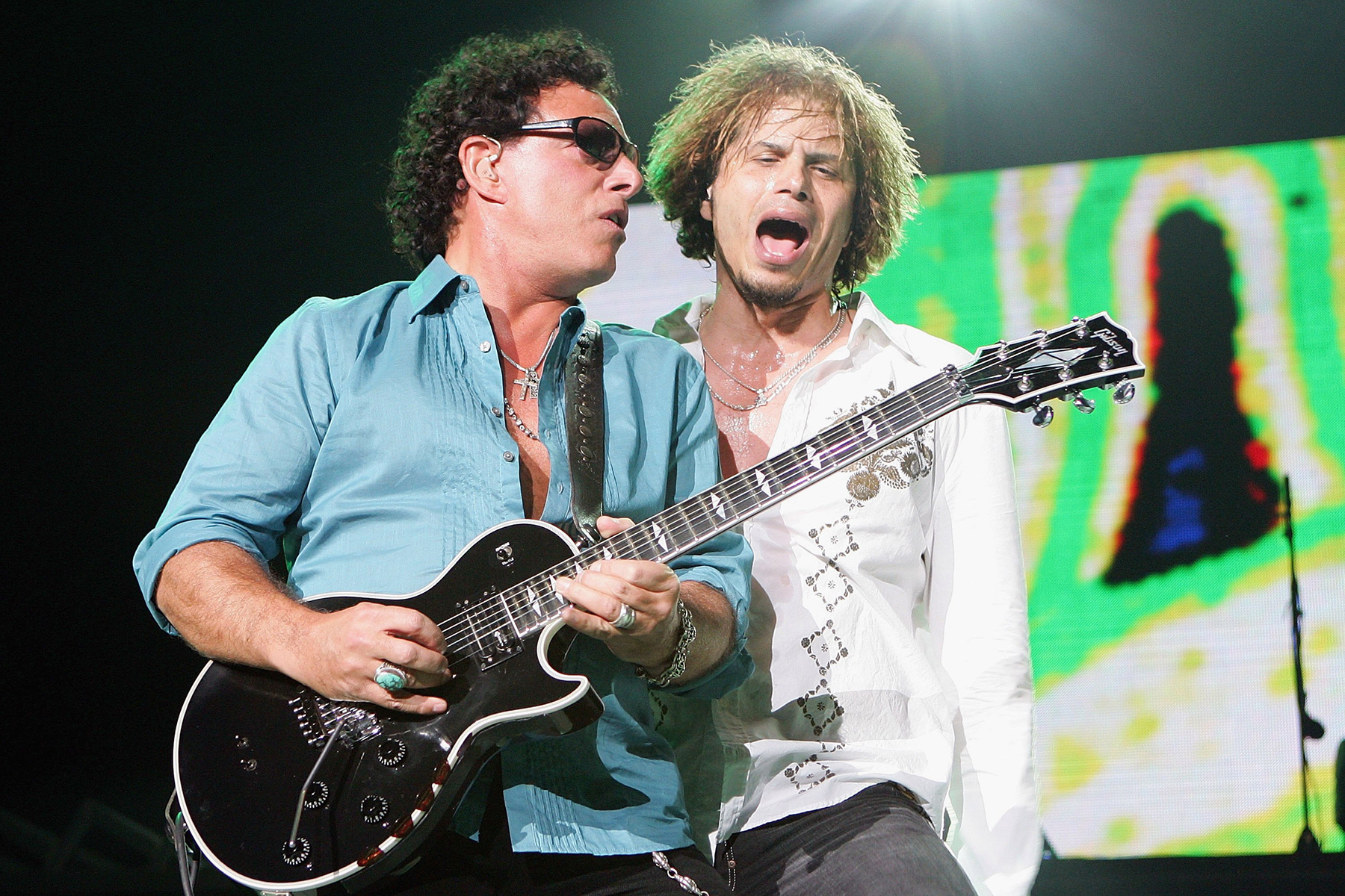 LAS VEGAS - AUGUST 18:  Journey guitarist Neal Schon (L) and singer Jeff Scott Soto perform during a sold-out show at the Mandalay Bay Events Center August 18, 2006 in Las Vegas, Nevada. The rock group is touring in support of the album, "Generations."  (Photo by Ethan Miller/Getty Images)