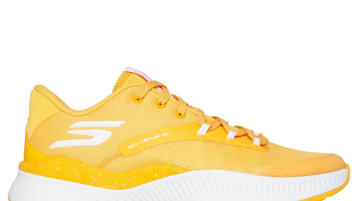 Bright yellow running shoe with orange laces, white side logo, and a thick white sole against a white background