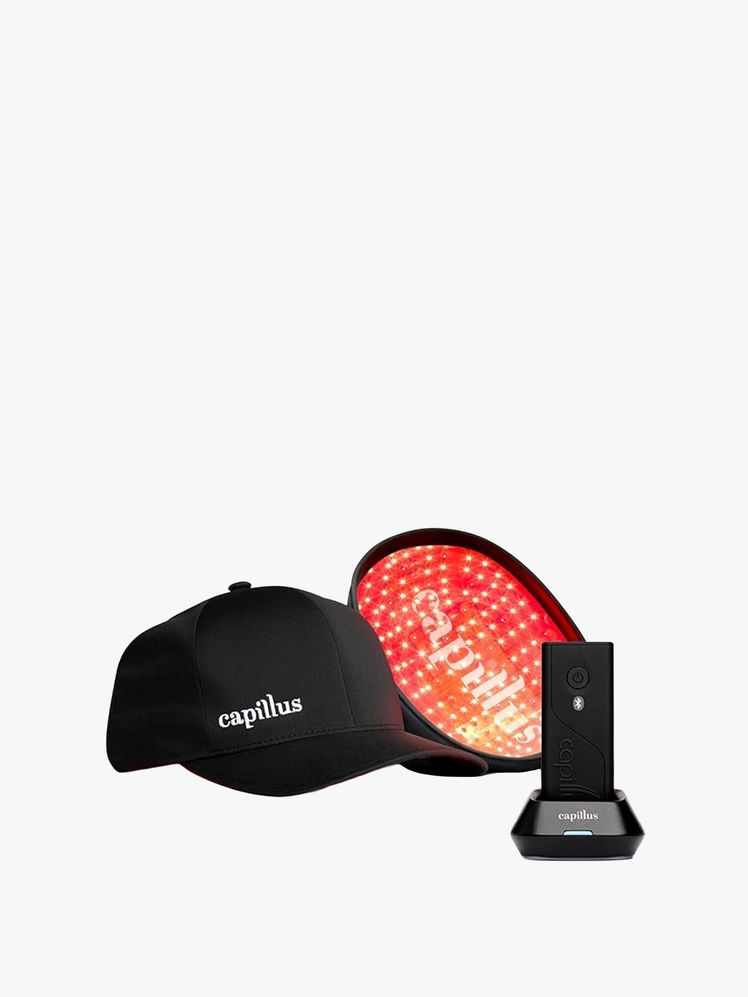 Image may contain: Cap, Clothing, Hat, Baseball Cap, Light, Traffic Light, and Electronics