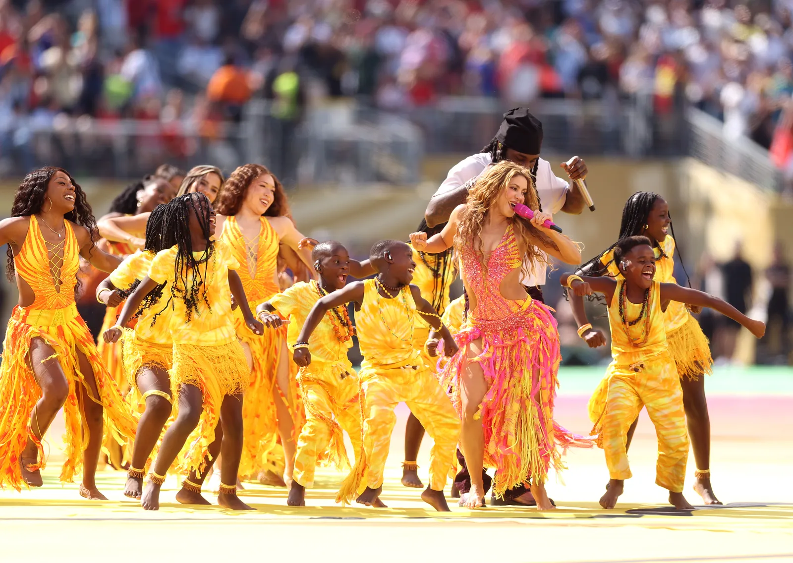 Image may contain Shakira Burna Boy Brian Sylvestre Dancing Leisure Activities Person People and Adult