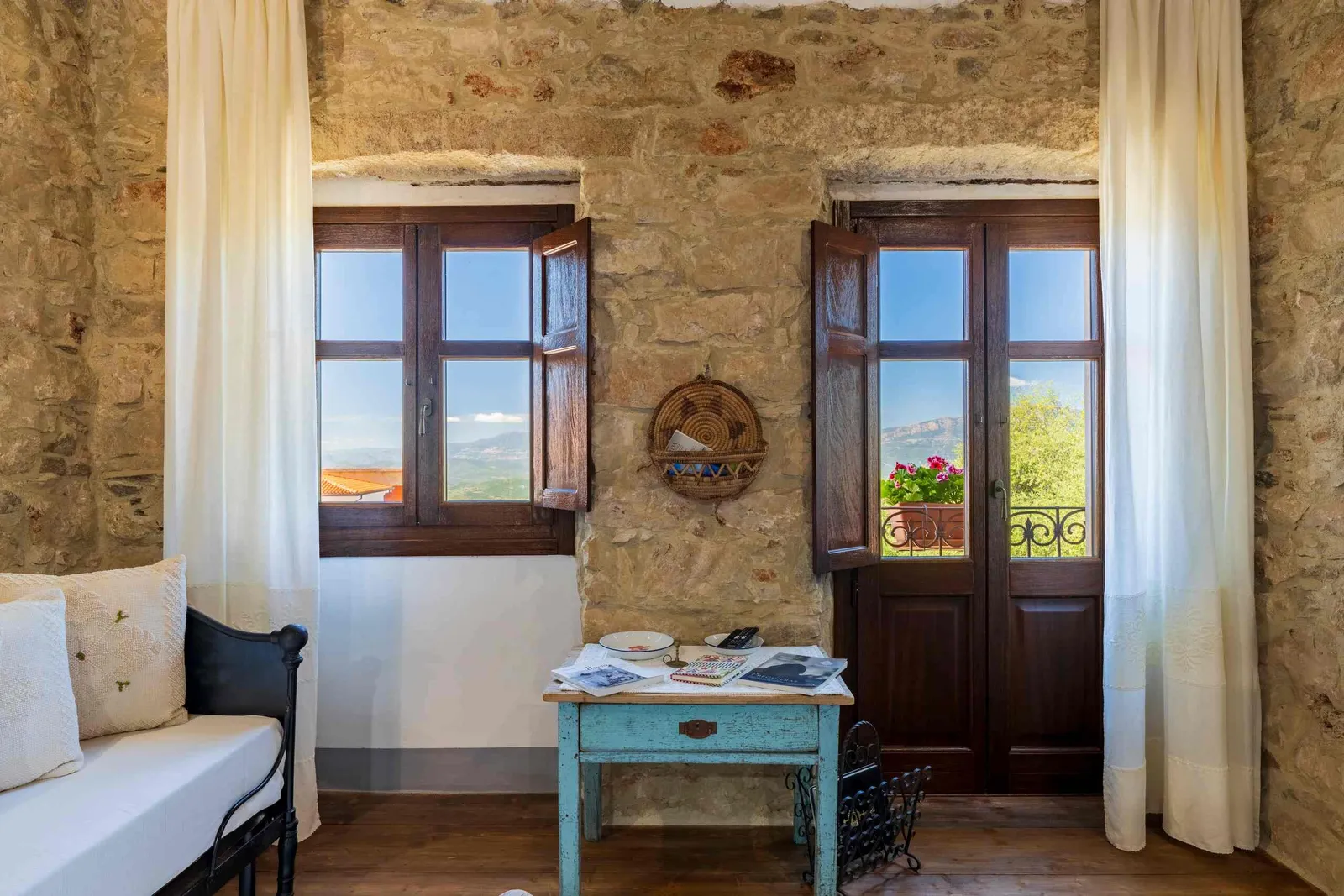 Image may contain Indoors Interior Design Hardwood Stained Wood Wood Window Desk Furniture Table Plate and Book