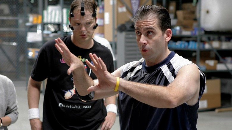 Steve Carell as Michael, preparing the office for a basketball game in The Office.