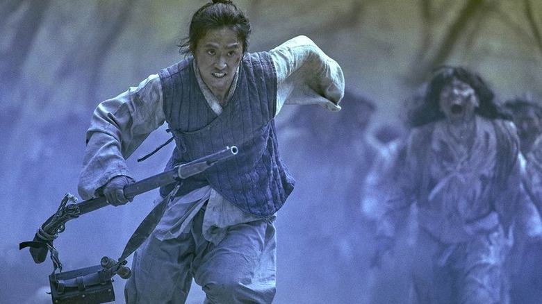 Yeong-shin (Kim Sung-kyu) running from zombies on "Kingdom."