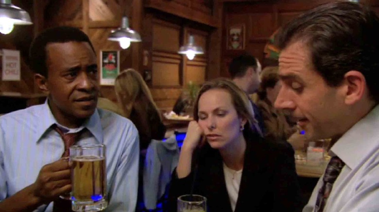 Christian, Jan, and Michael sit around beers at Chilis in The Office.