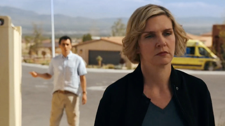 Carlos Manuel Vesga as Manousos Oviedo and Rhea Seehorn as Carol Sturka in "Pluribus."