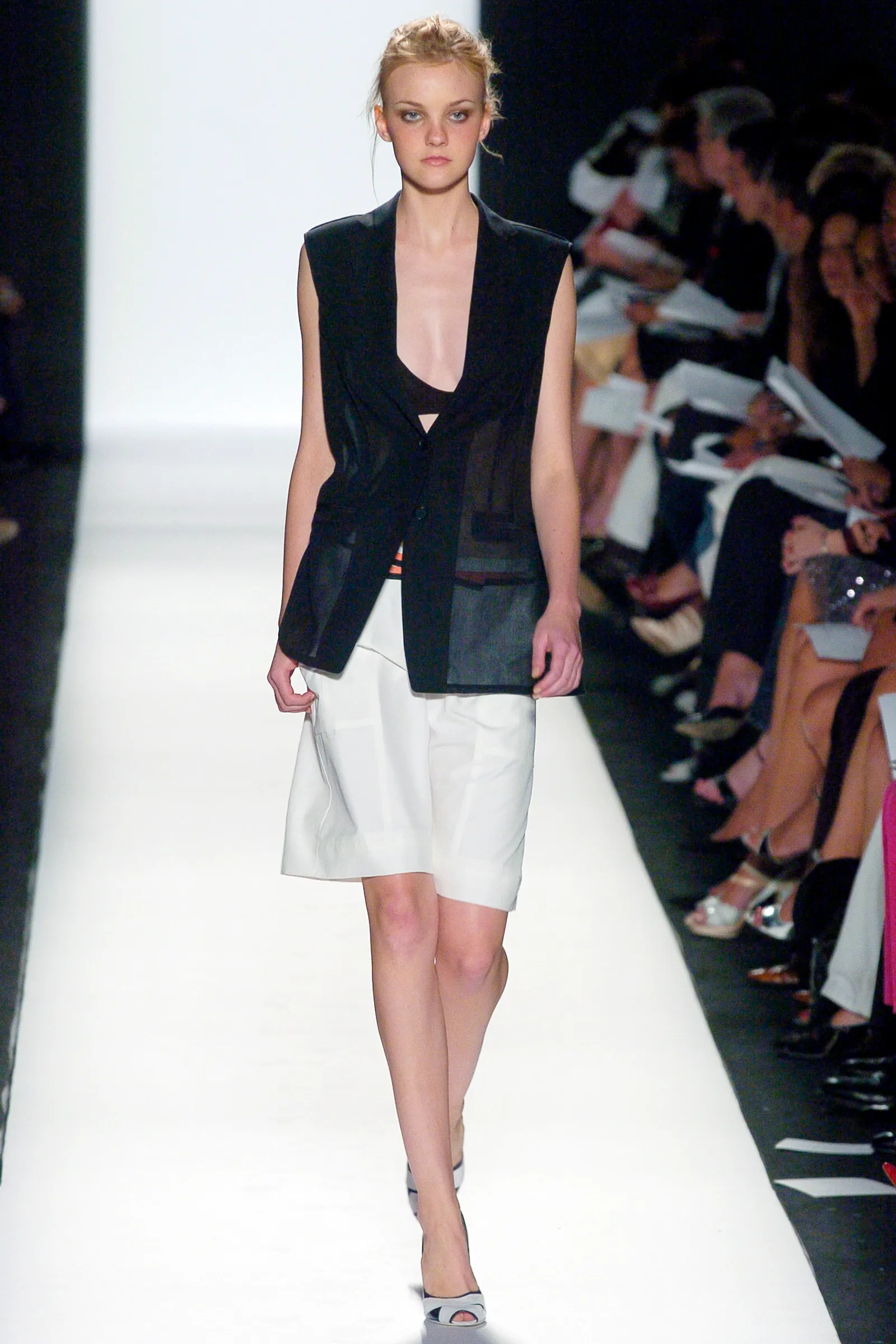 Image may contain Caroline Trentini Fashion Person Runway Clothing Skirt Footwear Shoe Shorts and High Heel