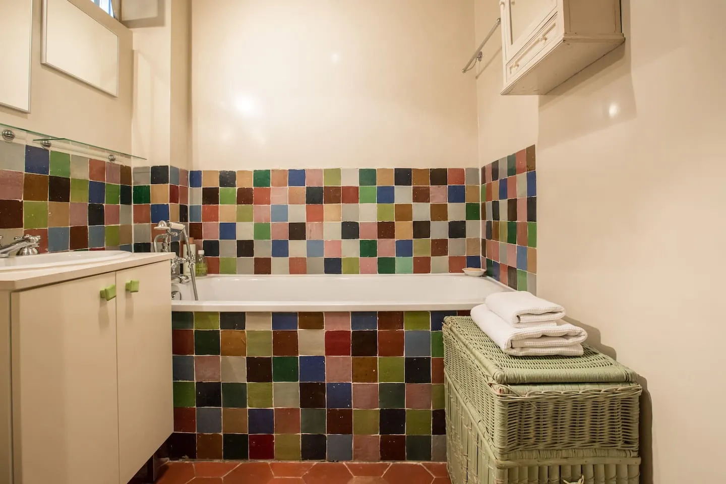 Image may contain Indoors Interior Design Tile Floor Bathing Bathtub Person and Tub