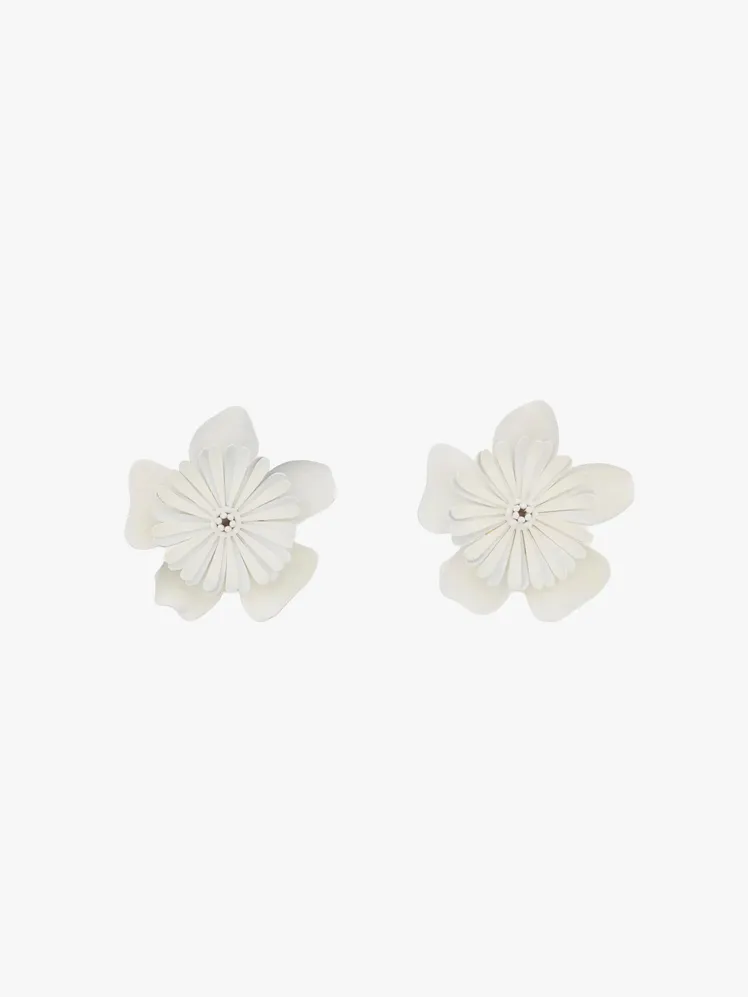 Image may contain: Accessories, Earring, Jewelry, Flower, Plant, Anemone, and Daisy