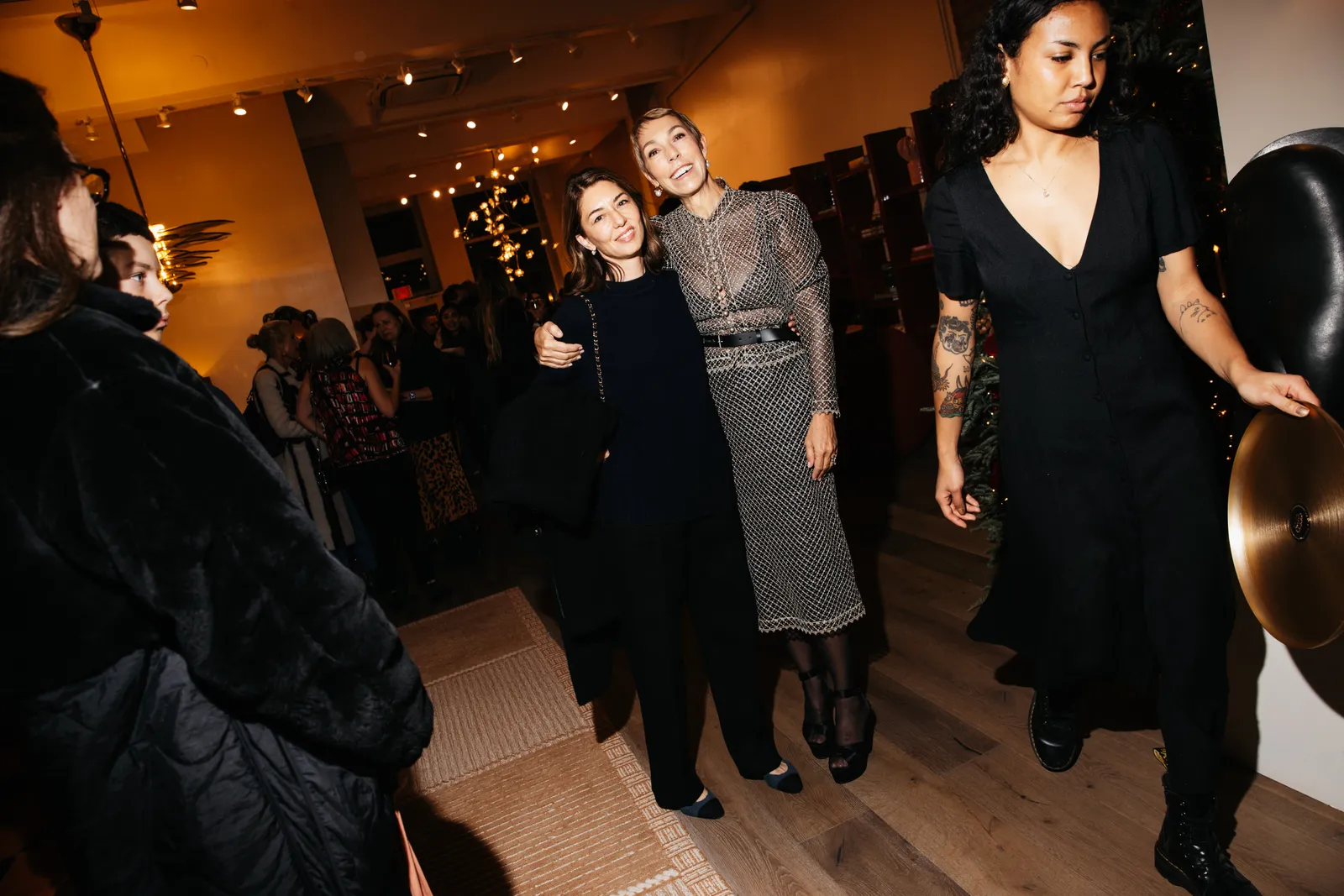 Image may contain Sofia Coppola Urban Clothing Footwear Shoe Adult Person Photobombing Dress Coat People and Face