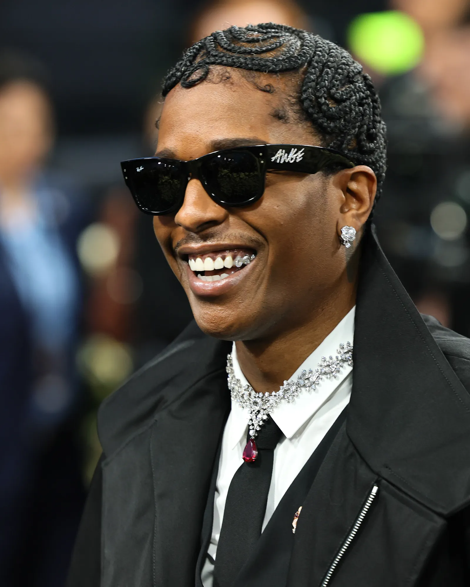 Image may contain AAP Rocky Accessories Sunglasses Head Person Face Adult Clothing Coat Hair Happy and Smile