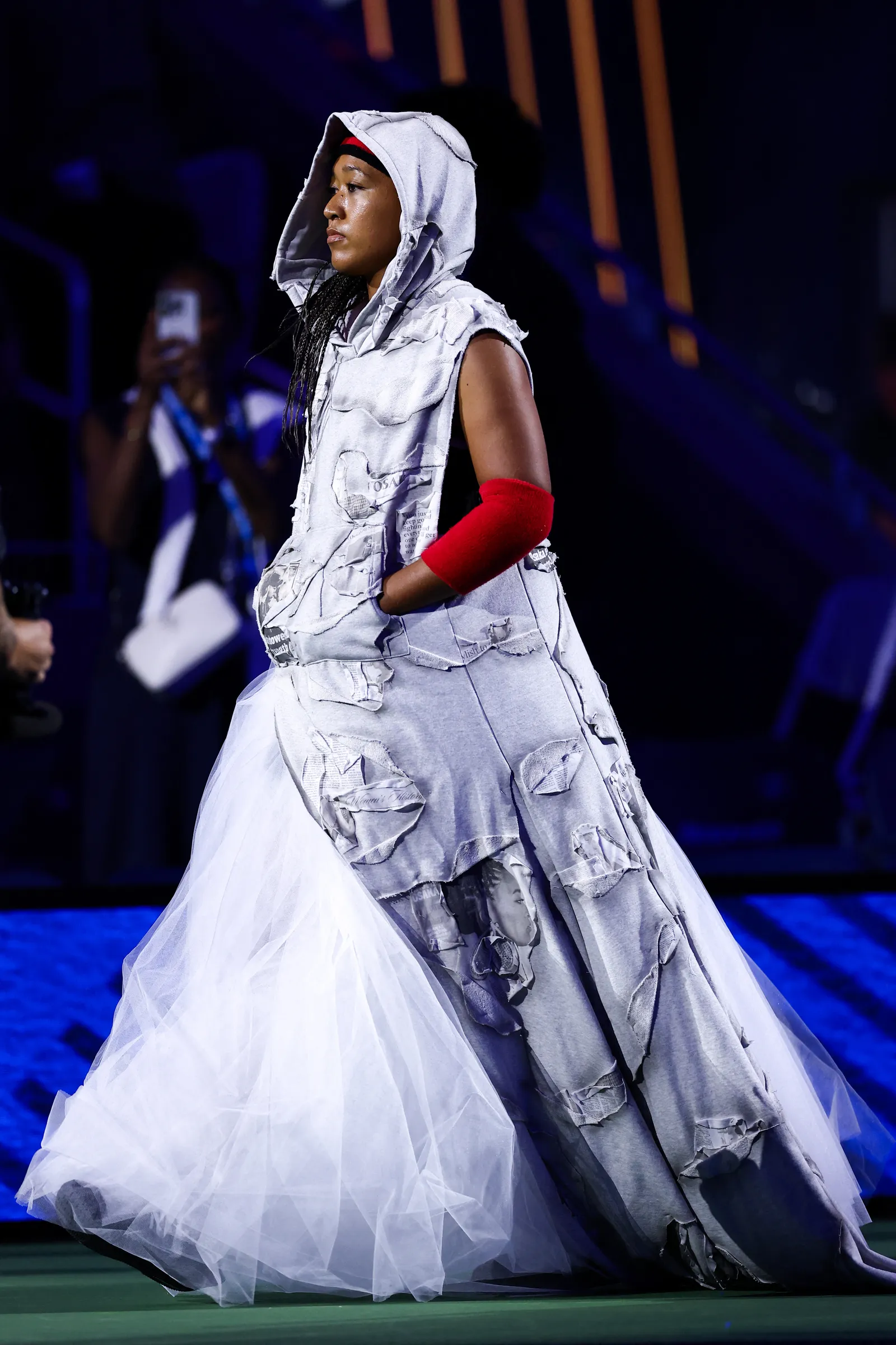 Image may contain Naomi Osaka Performer Person Solo Performance Fashion Adult Wedding Clothing and Dress
