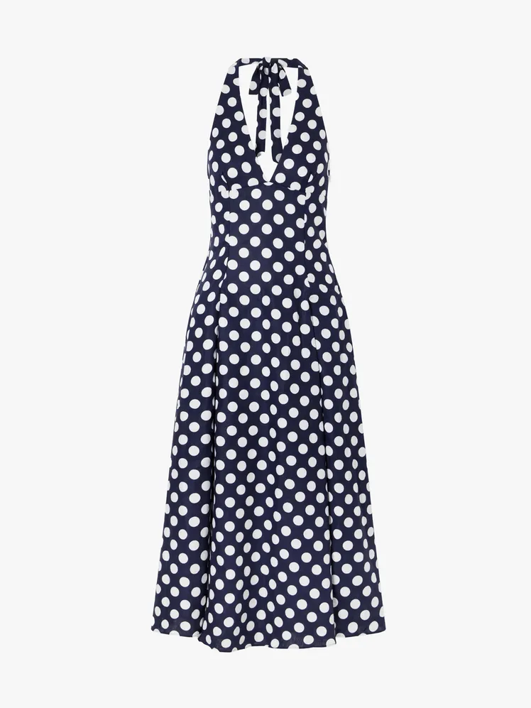 Image may contain: Pattern, Clothing, Coat, Dress, and Polka Dot