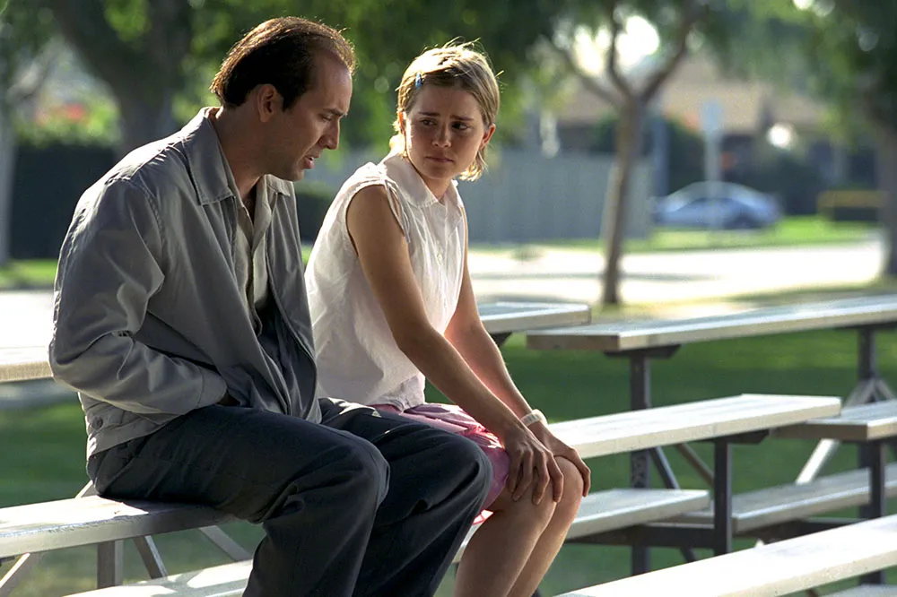 Nicolas Cage and Alison Lohman in MATCHSTICK MEN, 2003.