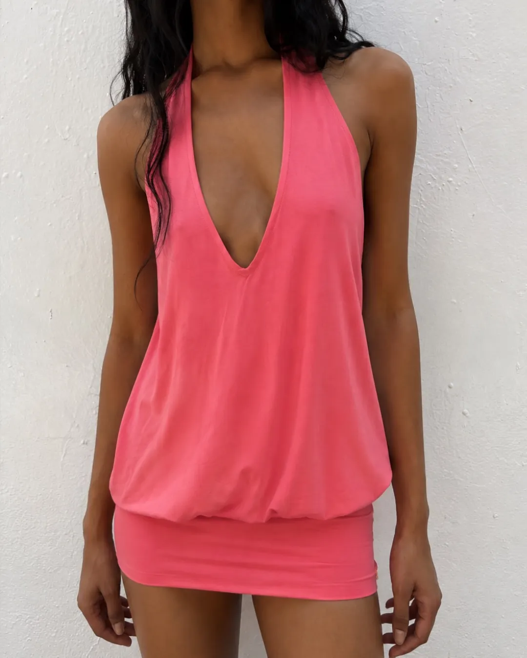 Image may contain Clothing Tank Top Vest Blouse and Swimwear