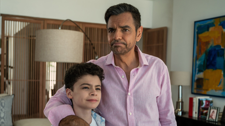 Maximo with his arm around his nephew Hugo