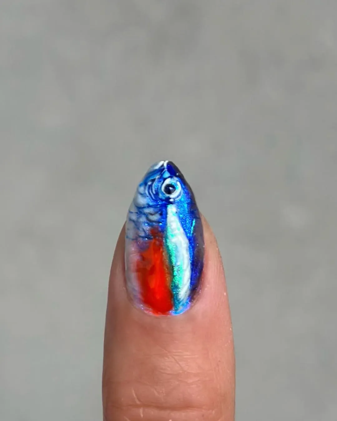 Image may contain Body Part Finger Hand Person Accessories Gemstone Jewelry Animal Fish and Sea Life