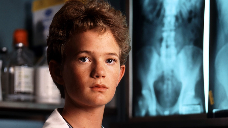 M.D., Howser staring off in Doogie Howser, M.D.