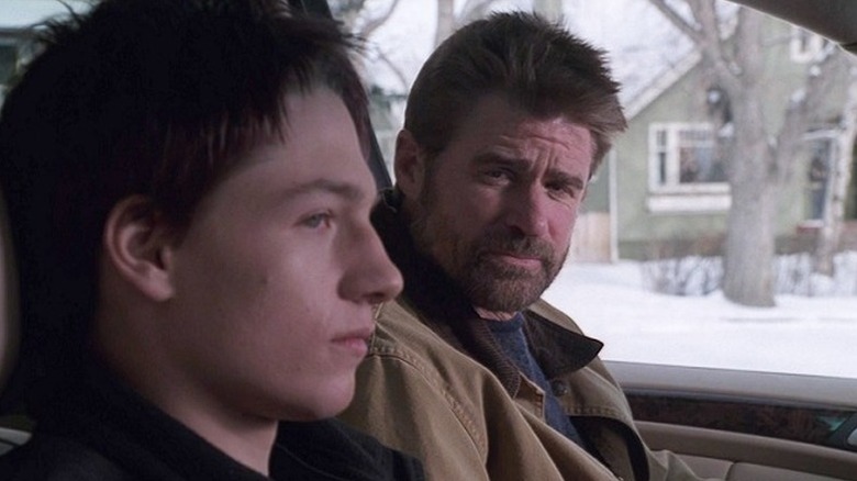 Gregory Smith sitting in passenger seat of car next to Treat Williams as Andy in Everwood