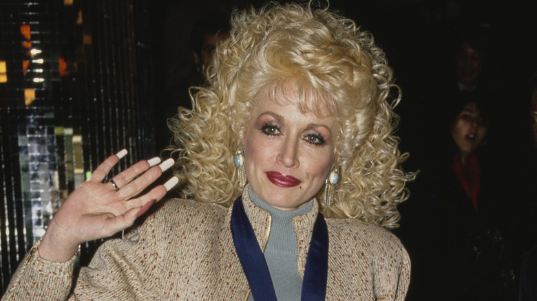 Dolly Parton leaves the "Ms Magazine's Women of the Year" ceremony, held at the Roseland Ballroom in New York City on January 12,1987.