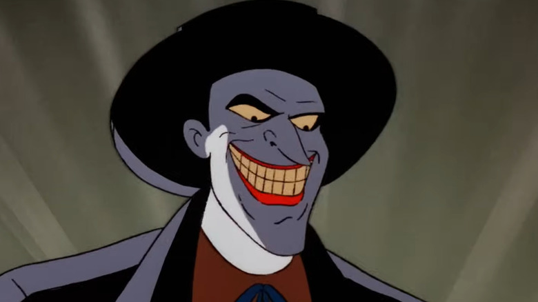 The Joker wearing a hat and smiling in "Batman: The Animated Series" (1992)