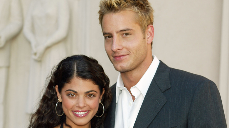 Lindsay Korman and Justin Hartley from "Passions" smiling at an event in 2003
