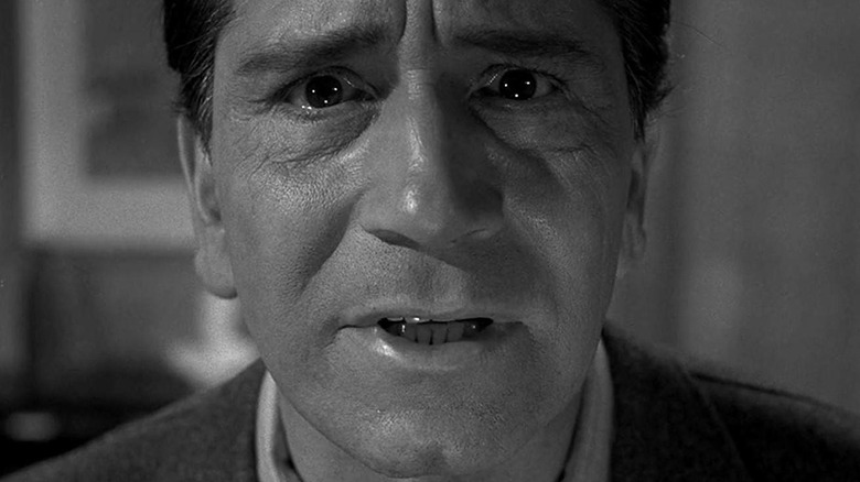A close-up of Edward Hall looking scared