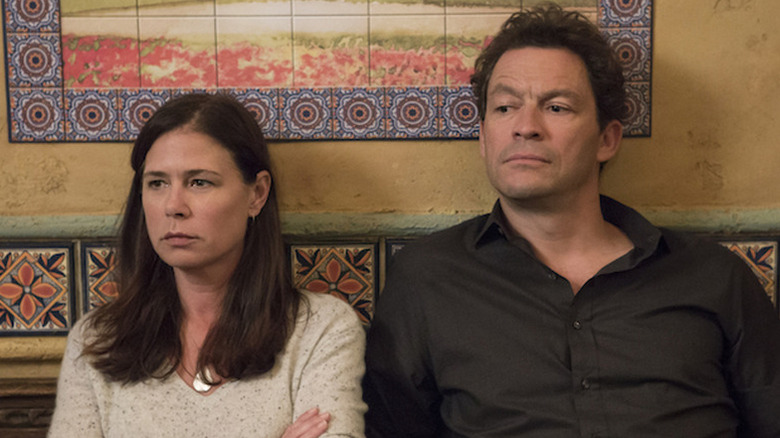 Helen and Noah sit next to each other in "The Affair"