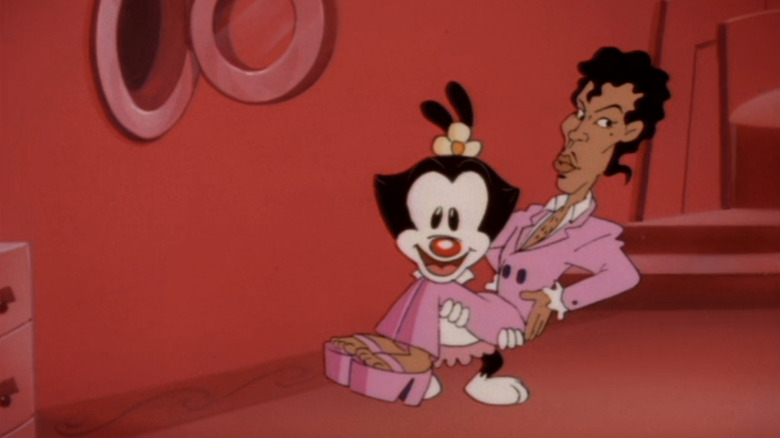 Dot holding an animated version of Prince in "Animaniacs" (1993)