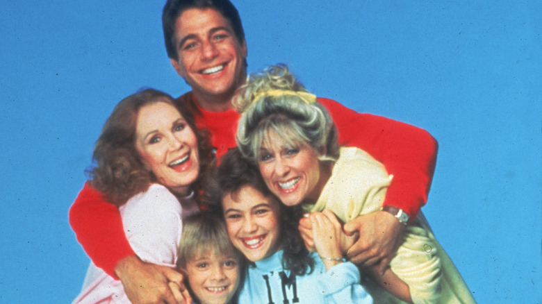 the cast of "Who's the Boss?" (1984) pose together for a portrait