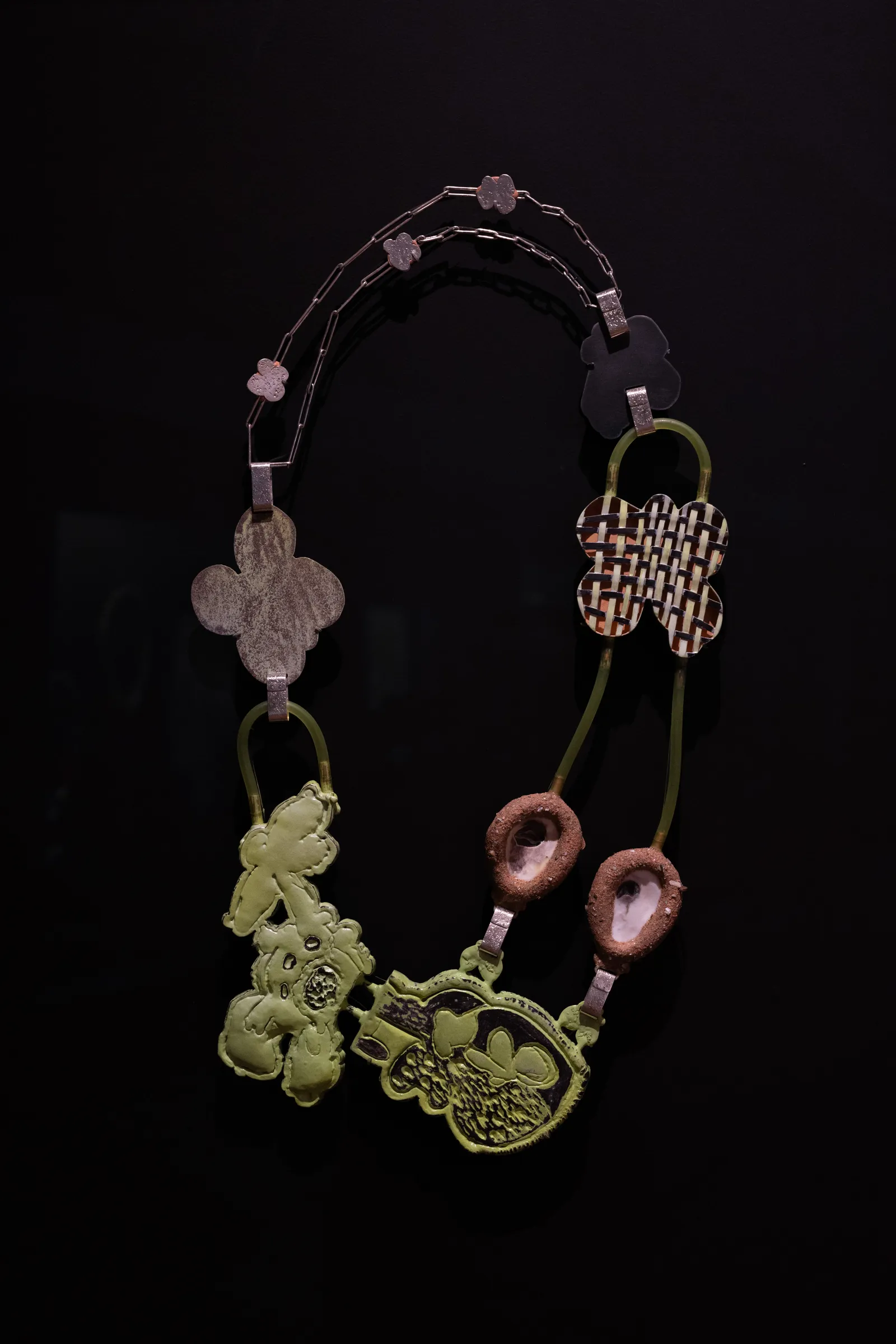 Image may contain Accessories Earring Jewelry Bracelet Necklace Art and Handicraft