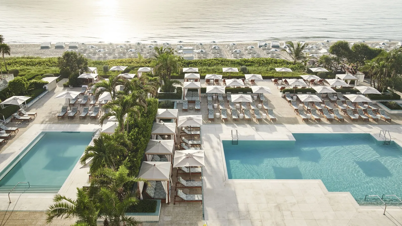 Image may contain Pool Water Swimming Pool Outdoors Plant Aerial View Chair and Furniture