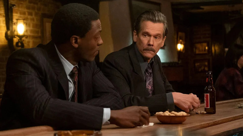 Decourcy Ward (Aldis Hodge) and Jackie Rohr (Kevin Bacon) speak to each other at a bar in City on a Hill