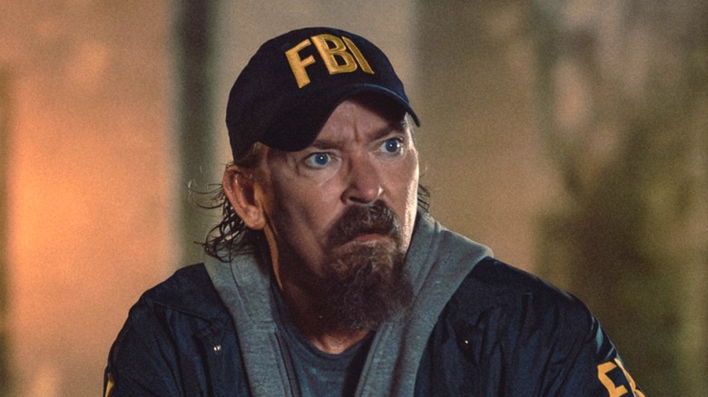 James Jordan as Two Cups in FBI jacket and cap on "Lioness"