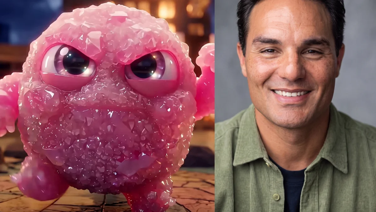 A pink animated creature with large eyes appears beside a smiling man in a green shirt.