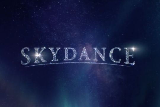 Skydance logo in sparkling white letters against a dark blue starry background.