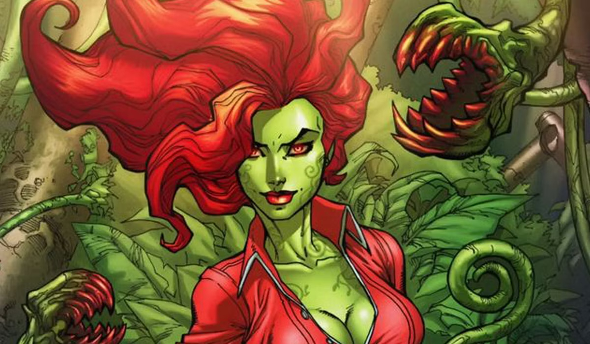 A green-skinned woman with flowing red hair stands among large, toothy plants in a comic-style illustration.