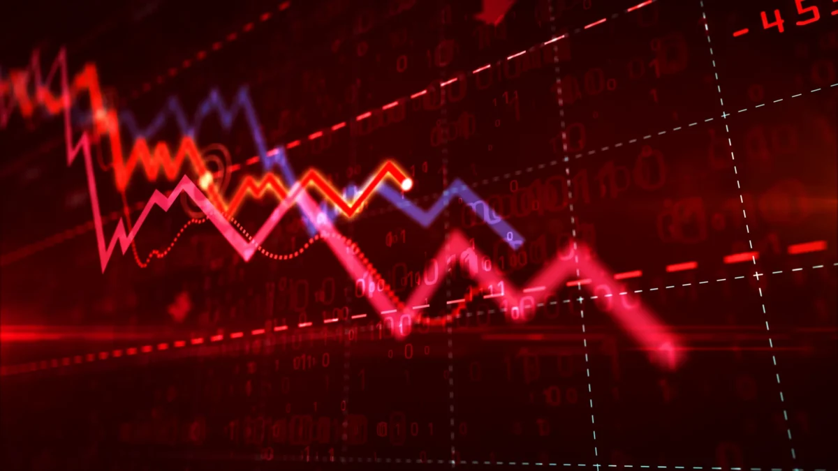 Red and blue zigzagging financial charts overlay a dark digital background with numbers and grid lines.