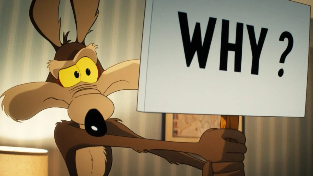 Cartoon coyote with yellow eyes holds a large white sign reading “WHY?”